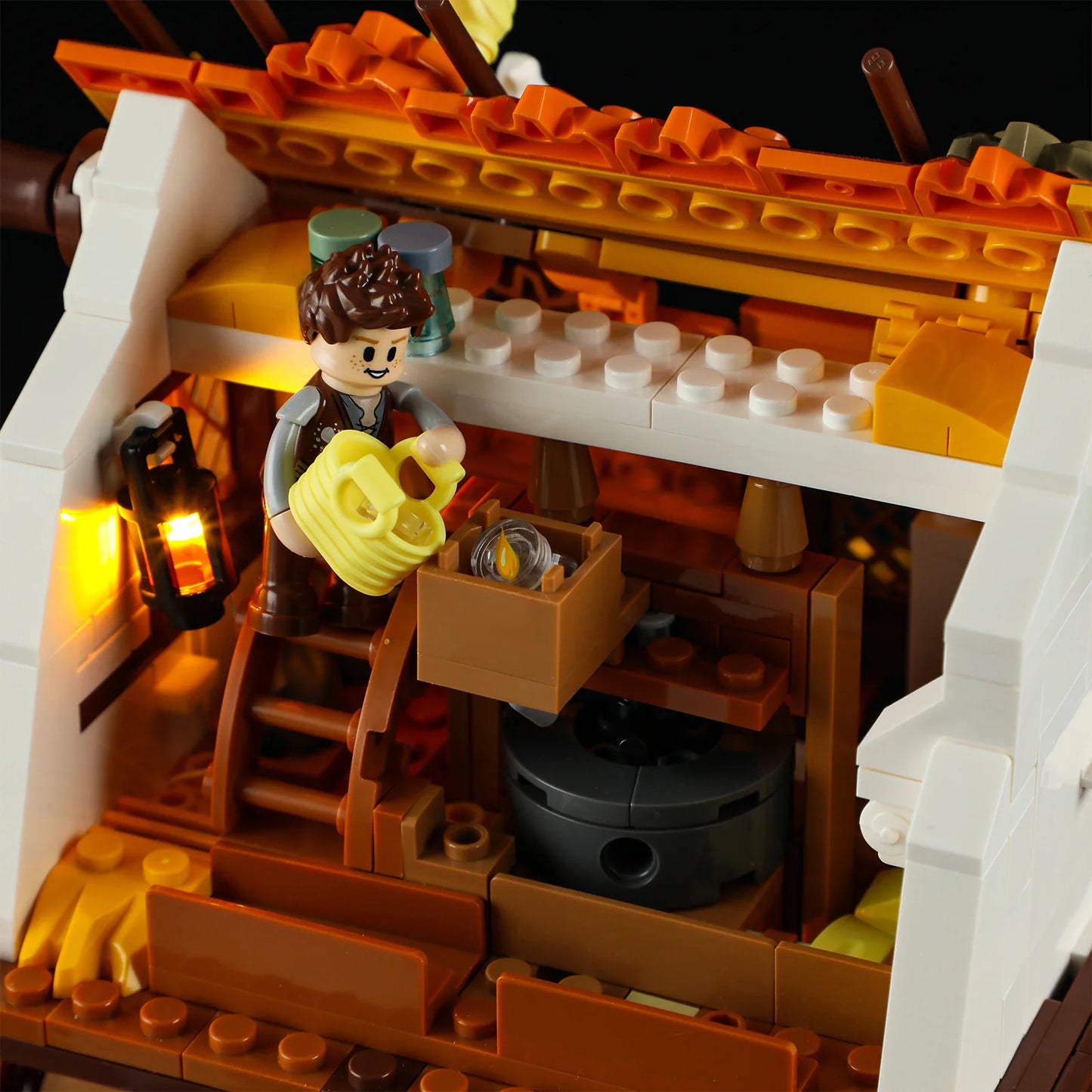 Lumibricks (Formerly Funwhole) F9061 Medieval Water Mill interior with minifigure pouring grain, glowing lantern, and mill details