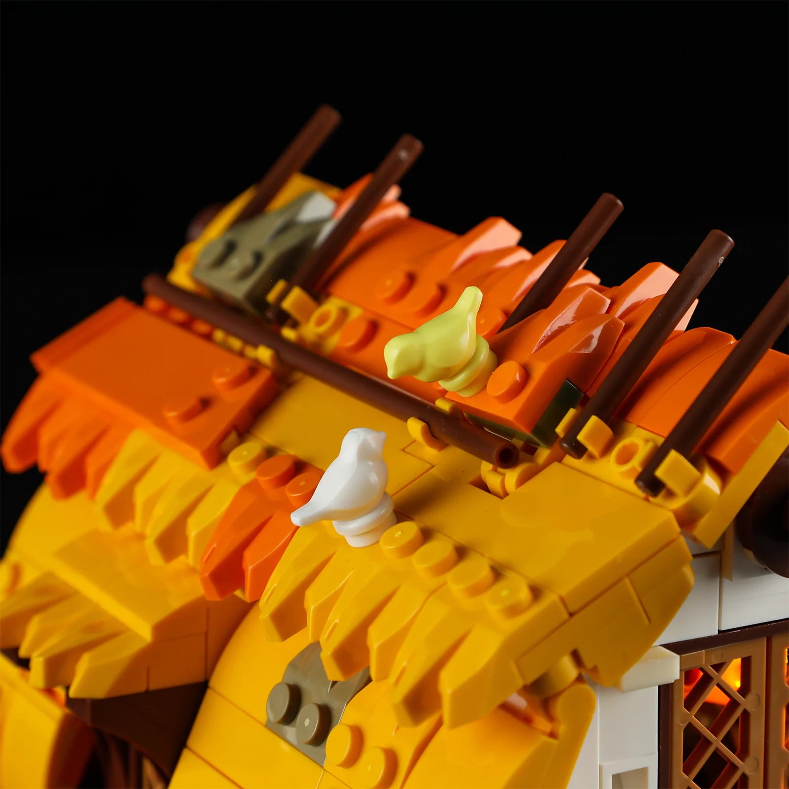 Lumibricks (Formerly Funwhole) F9061 Medieval Water Mill close-up of yellow thatched roof with brown beams and perched birds
