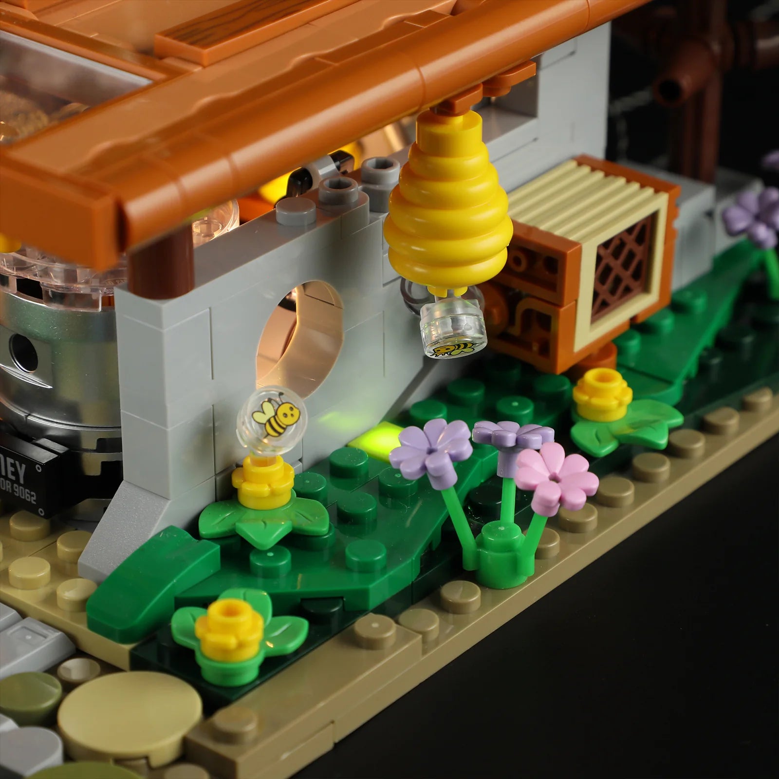Lumibricks (Formerly Funwhole) F9062 Bee Farm beehive with bee-printed domes, yellow hive, and blooming flowers