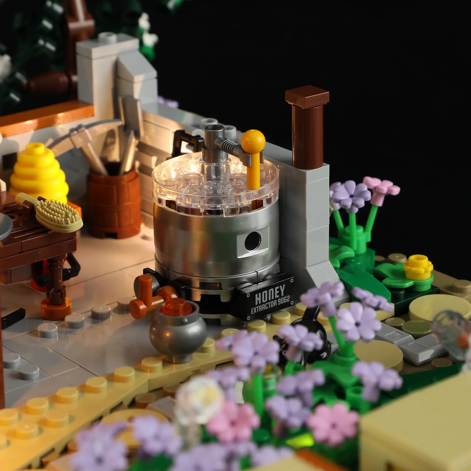 Lumibricks (Formerly Funwhole) F9062 Bee Farm honey extractor station with tools, barrels, and flower garden details