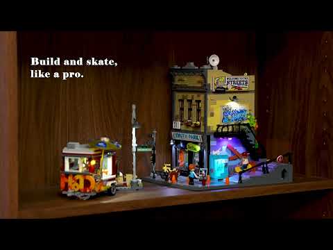 Funwhole Skate Shop video showcasing modular building, LED lights, mini-figures, graffiti, and skateboard ramp in a city setting