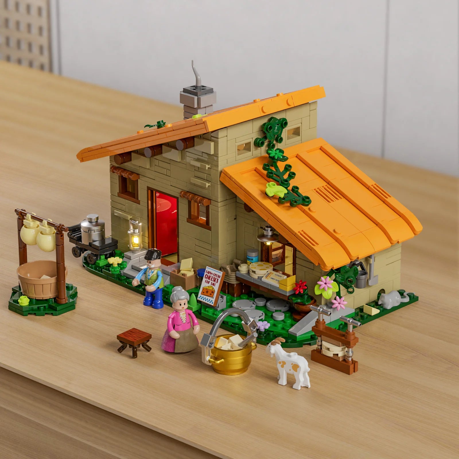 Lumibricks (Formerly Funwhole) F9049 Farm Cheese House on tabletop with minifigures, goat, cheese-making tools, and detailed farmhouse exterior